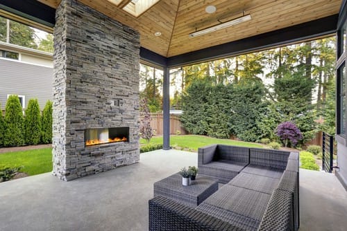 New Modern Home Features A Backyard With Covered Patio Accented